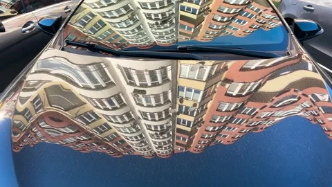 Reflections of residential buildings on a car windshield. Stock Footage 338240180