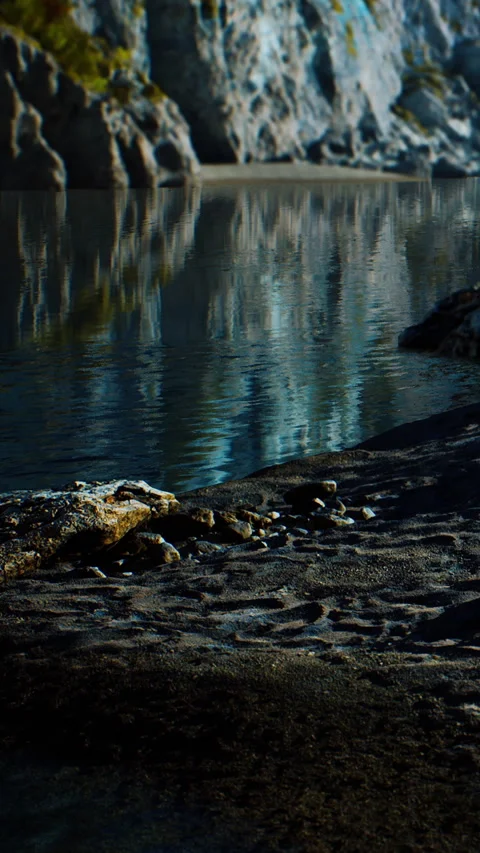 Reflections of rocks and trees in still water at a riverbank Video stock 347168293