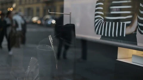 Reflections from a showcase of people walking Stock-Footage 57213115