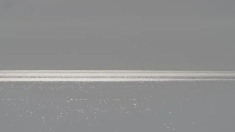 Reflections of the sun on the ocean Stock Footage 169645921