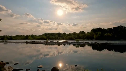 Reflections of the sun on the river Stock Footage 222832873