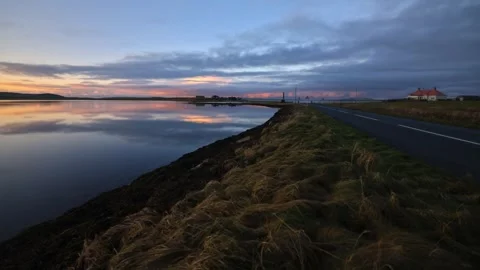 Reflections at sunset below the Standing stones looking over to the watch stone  Stock Footage 297280635