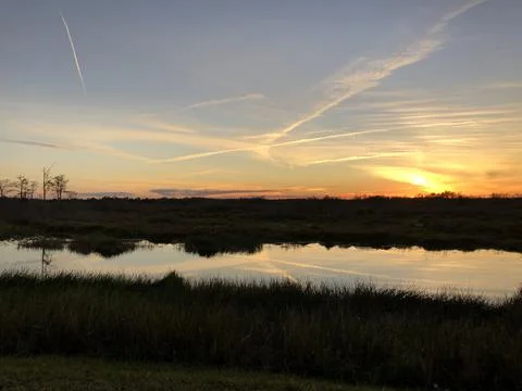 Reflections of sunset in the river Stock Photos