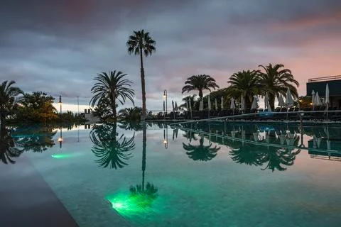 Reflections of sunset on a swimming pool Stock Photos