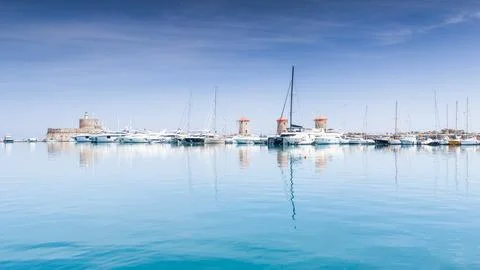 Reflections on the three windmills in Rhodes Stock Photos