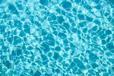 Reflections on the water in a clear pool Stock Photos