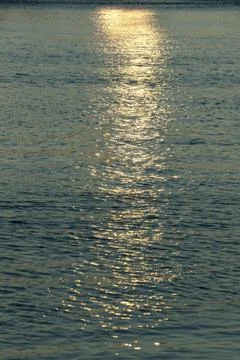 Reflections on water during sunset Stock Photos