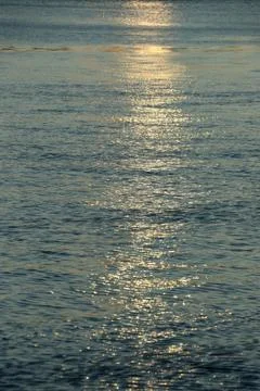 Reflections on water during sunset Stock Photos