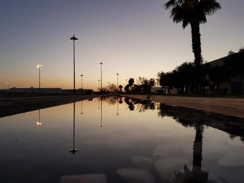 Reflections in the water at dusk Stock Photos