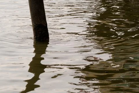 Reflections on the water in the evening. Stock Photos