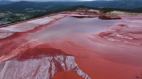 Reflections On Waters Of Red Mud Pond At Reservoir Stock Footage 285758063