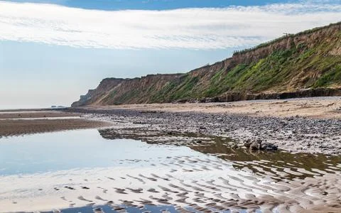 Reflections on West Runton beach Stock Photos