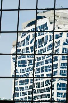 Reflections on the windows of skyscrapers Stock Photos