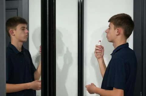 Reflections of a young man contemplating his future during a quiet moment i.. Stock Photos