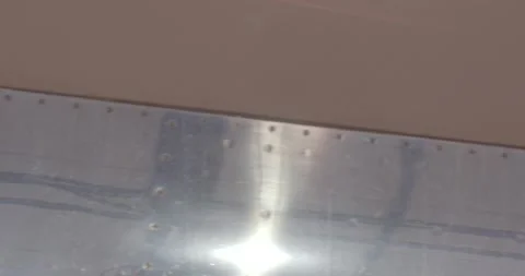 Reflective aircraft surface. Closeup of polished aircraft wing Stock-Footage 333877472