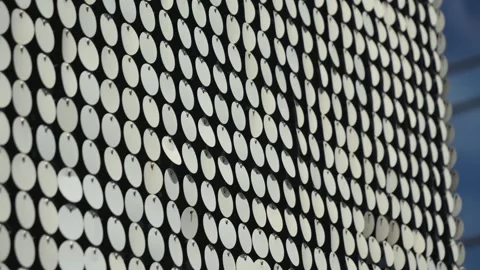 Reflective circular pattern. Metallic, reflective, circular discs, sequins or Stock Footage 329279529