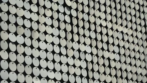 Reflective circular pattern. Metallic, reflective, circular discs, sequins or Stock Footage 330948039