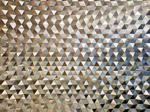 Reflective Geometric Triangle Pattern Wall Texture. Stock Photos