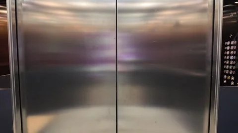 Reflective Hotel Elevator Doors and Metal Interior Details in Gothenburg Stock-Footage 347680190