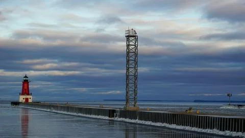 Reflective ice north pier lighthouse Menominee Wisconsin Stock Photos