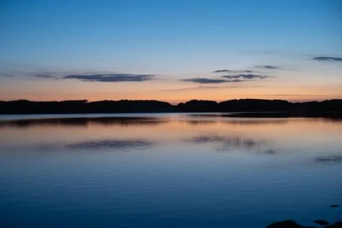 Reflective Lake  at Sunset Photos