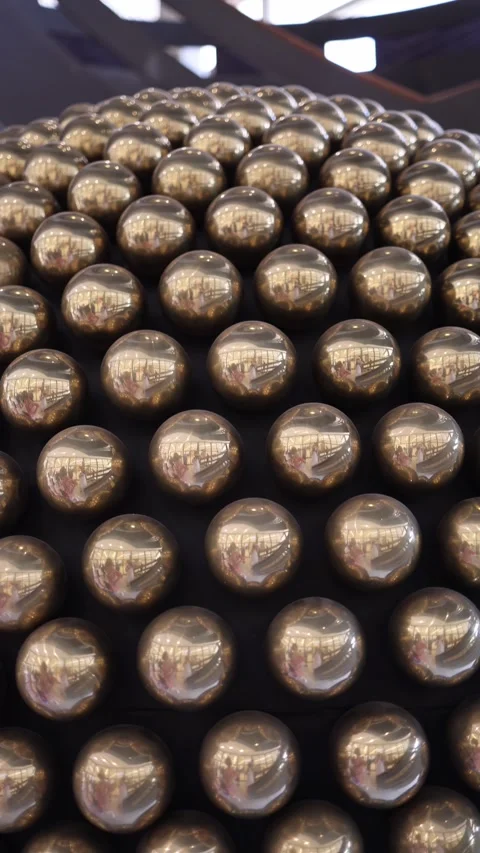 Reflective metallic spheres abstract installation Stock Footage 335584034