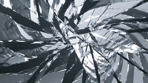 Reflective Mirror Panels Falling into Infinite Spiral Illusion and Cracking  Stock Footage 333632506