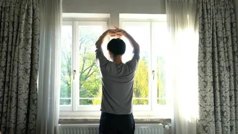 Reflective Moment by the Window Stock Footage 314611711