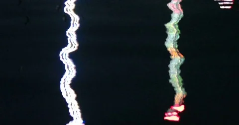 Reflective Night Lights on a Water Surface on the Kiel Week Festival in Germa Stock Footage 77101036