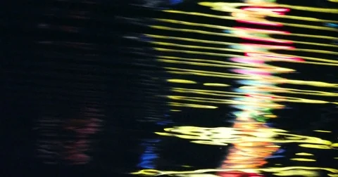 Reflective Night Lights on a Water Surface on the Kiel Week Festival in Germa Stock-Footage 77102105