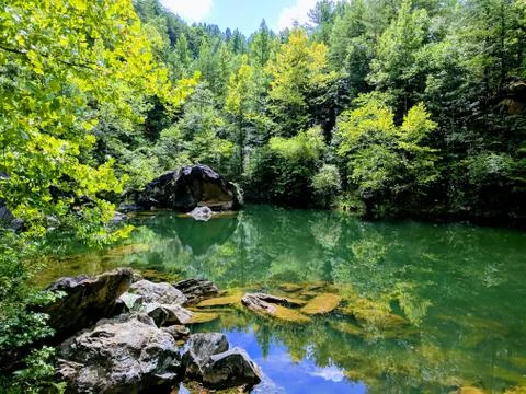 Reflective Quarry Pond Stock Photos