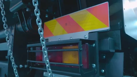Reflective red and yellow sticker above the rear lights of the new truck Vidéo 333344159