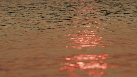 Reflective sea water texture during golden hour. Stock Footage 333159097