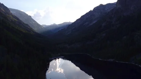 Reflective Sunset on Glassy Lake Stock Footage 71695068