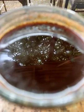 Reflective Surface of Dark Brew Stock Photos