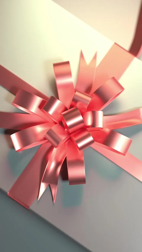 The reflective surface enhances a gift box with a beautiful bow, surrounded.. Stock Footage 294325119