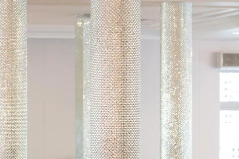 Reflective textured surface with sparkling light creating an abstract lumin.. Photos