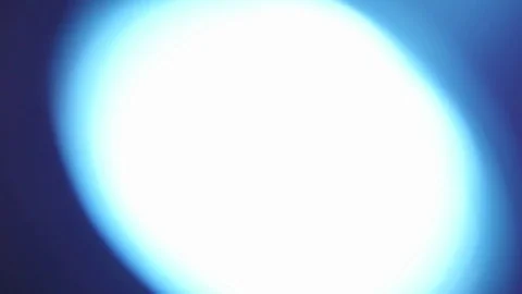 Reflector blue light in front of which is rotess dust clouds by the he Stock Footage 71048763