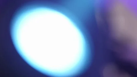 Reflector blue light in front of which is rotess dust clouds by the he Stock Footage 71339873