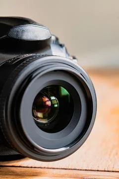 Reflex camera or dslr with reflexion on lens, photograph equipment, for pro.. Stockfoto's