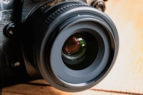 Reflex camera or dslr with reflexion on lens, photograph equipment, for pro.. Stock Photos