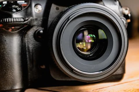 Reflex camera or dslr with reflexion on lens, photograph equipment, for pro.. Stock Photos