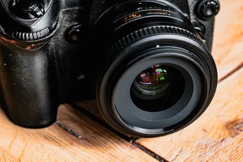 Reflex camera or dslr with reflexion on lens, photograph equipment, for pro.. Stock Photos