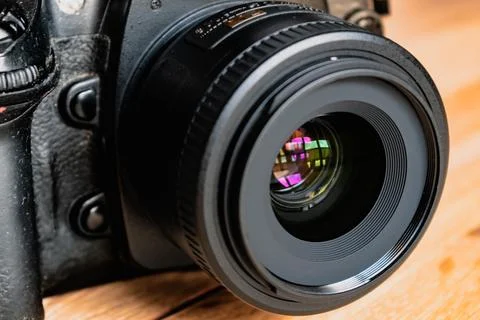 Reflex camera or dslr with reflexion on lens, photograph equipment, for pro.. Stock Photos