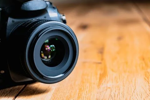 Reflex camera or dslr with reflexion on lens, photograph equipment, for pro.. Stock Photos