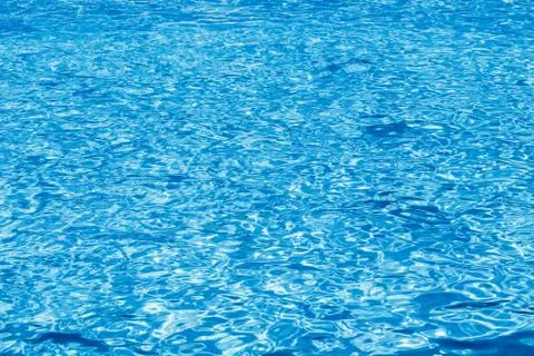 Reflex light on a vibrating surface of the water Photos