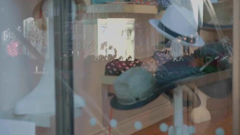 Reflexion of people in a shop window Stock Footage 100471492