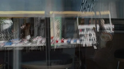 Reflexion in a store window Stock Footage 100464205
