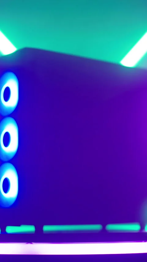 Refocus to cyberspace RGB gaming computer case surrounded with neon lights Stock Footage 324131520