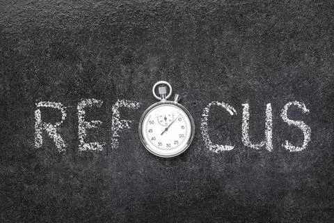 Refocus word watch Stock Photos